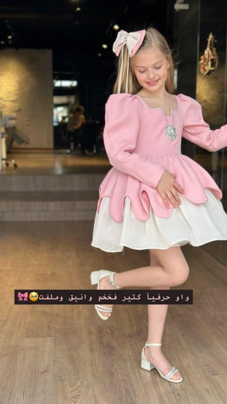 فستان الاميرات مع ببيونة شعر